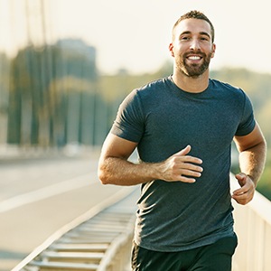 Healthy man jogging outdoors