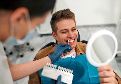 Patient in Medina Valley smiling in the dentist chair