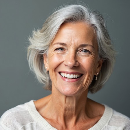 Smiling senior woman with beautiful teeth